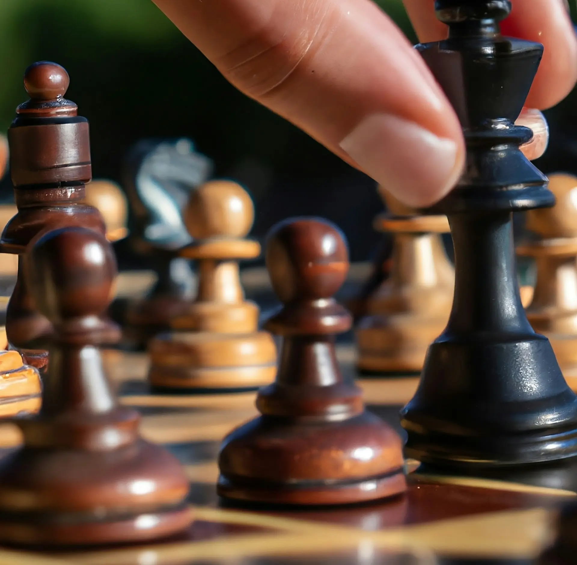 a close up of a person playing chess